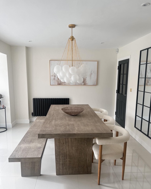 Bright kitchen with KUPLA brass chandelier