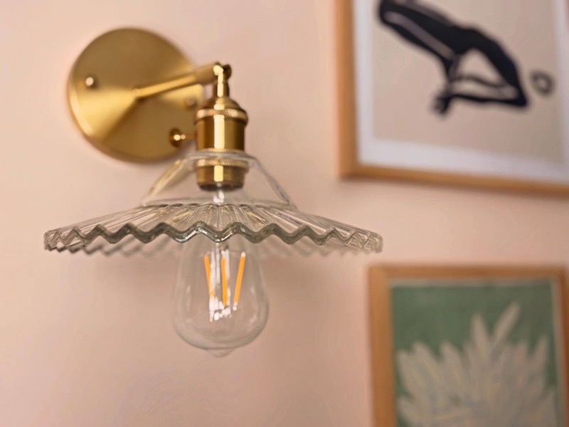 White galley kitchen with RAFI wall light