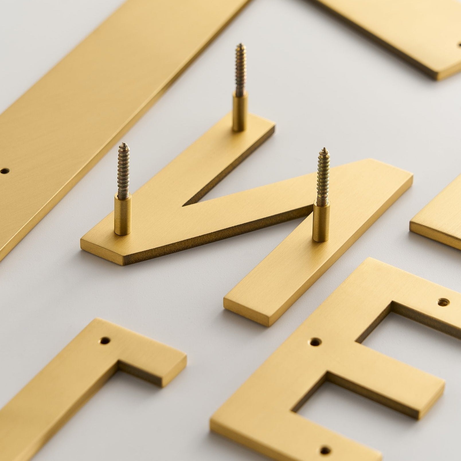 METRO Numbers in Satin Brass